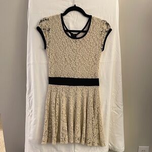 Elegant Lace Dress with Black Accents